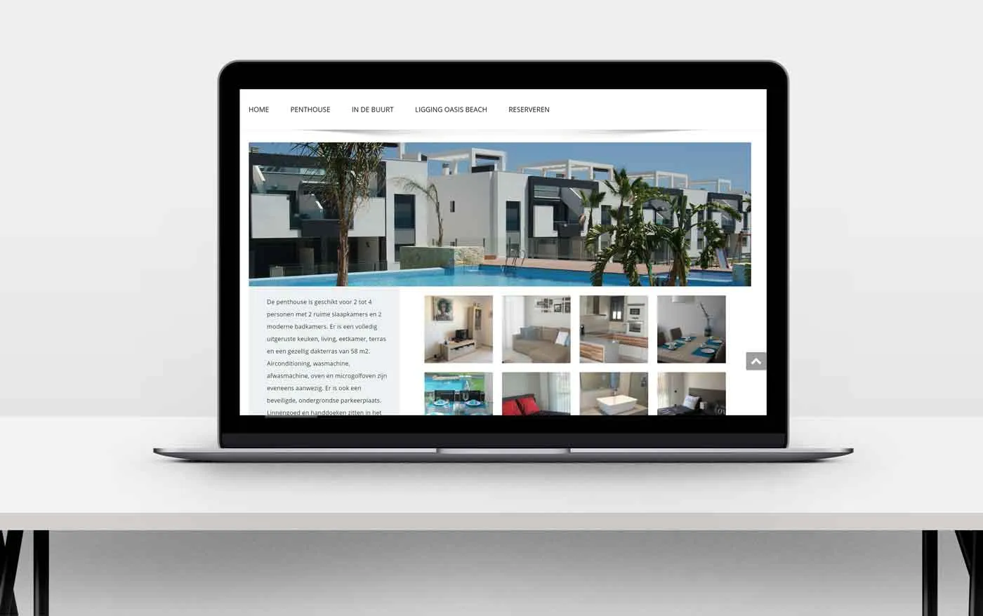 De verhuurwebsite op een laptop, met een fotogalerij van het appartement
